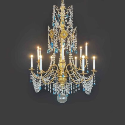 Empire Genoese Crystal and Gilt Wood Twelve-Light Chandelier