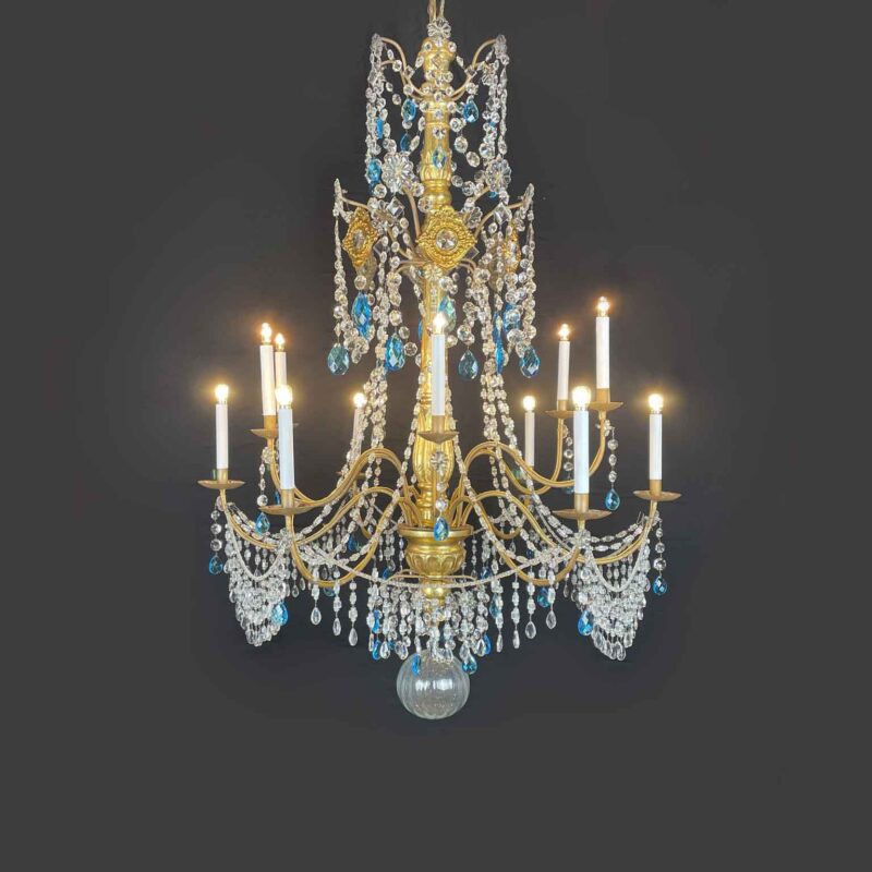 Empire Genoese Crystal and Gilt Wood Twelve-Light Chandelier